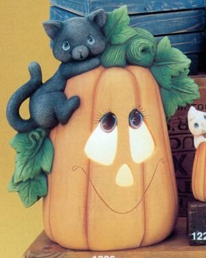 cat climbing pumpkin