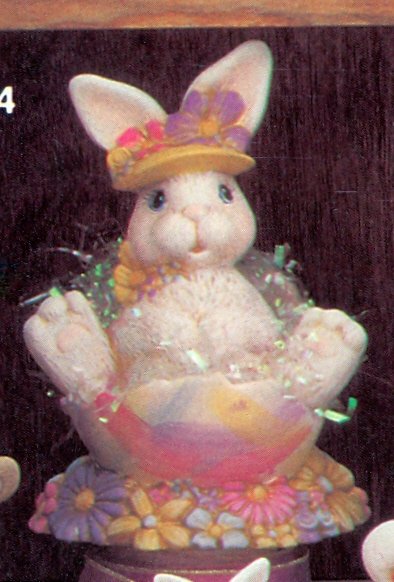 small bunny with flower base