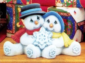 cuddle snow couple