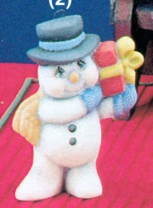 snowman with gift ornament snowman with gift ornament