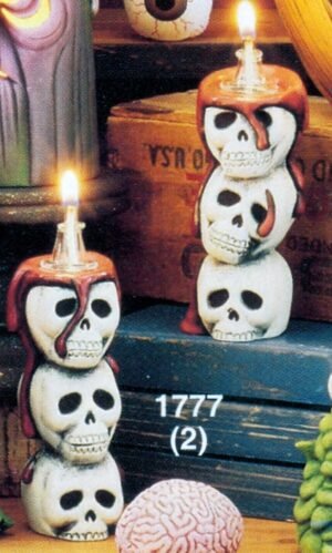 two skull oil lamps