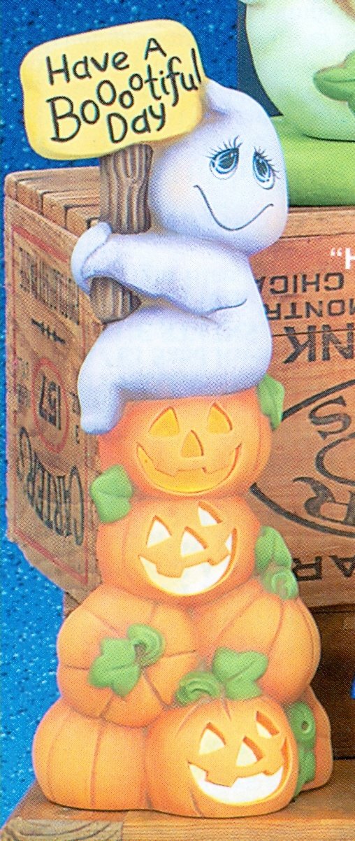 ghost on pumpkin stack