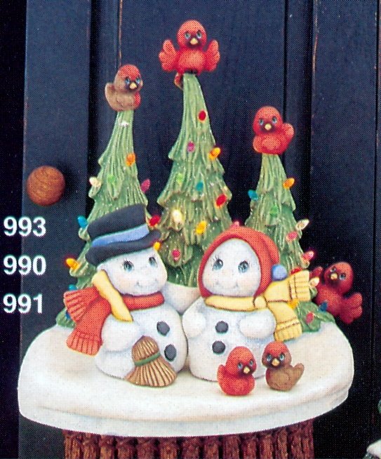 snow couple on tree base